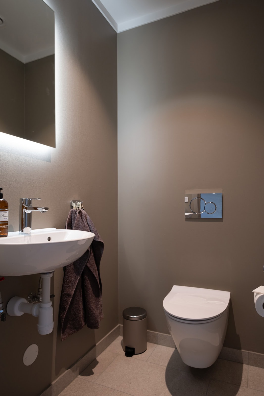 Separate toilet with washbasin